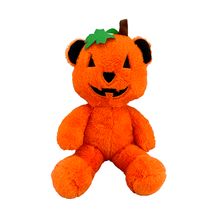 Super cute orange pumpkin style Halloween bear with a green patch on its head