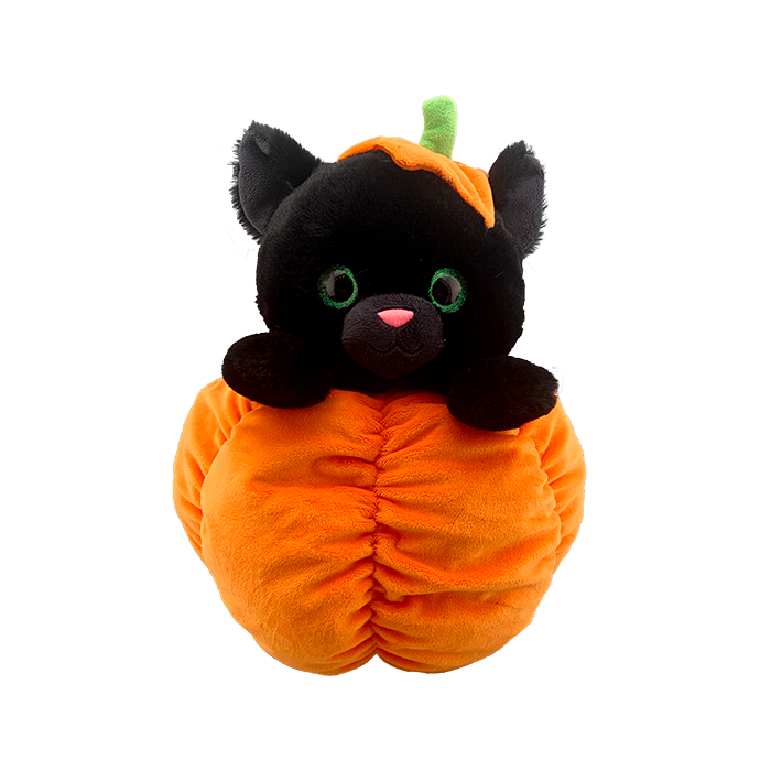 jet black cat with deep emerald green eyes peeking from a pumpkin