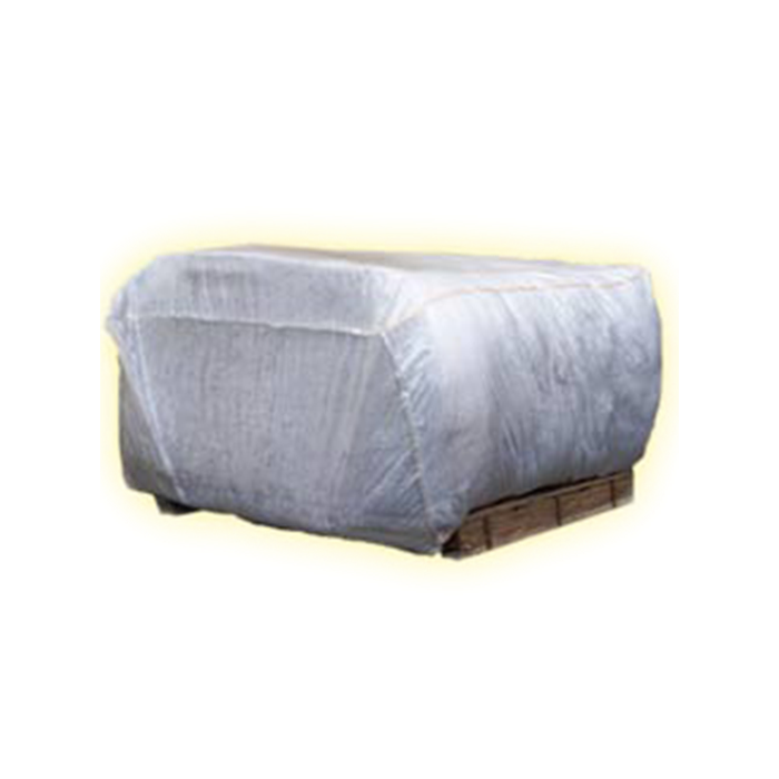 Bale of fiber wrapped in plastic on a pallet