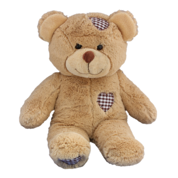Adorable cuddly brown teddy bear with heart shaped patches on the head and on the chest
