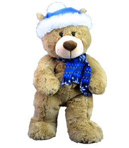 Cute teddy bear in a blue hat and plaid blue scarf