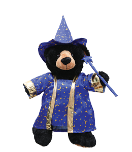 Magical blue wizard costume with golden accents and a pointy magicians hat with a wand dressed on a black plush toy bear