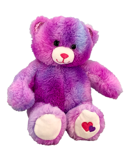 beautiful pink and purple teddy bear with glittering pink eyes and two cute hearts embroidered on one of its feet