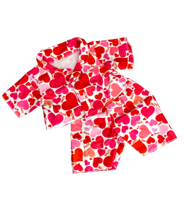 White pajamas with a lot of pink and red hearts on them!