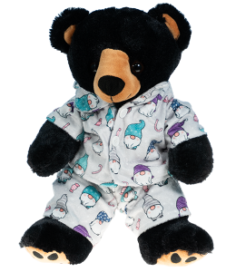 a black bear dressed in light grey PJ's with gnome prints