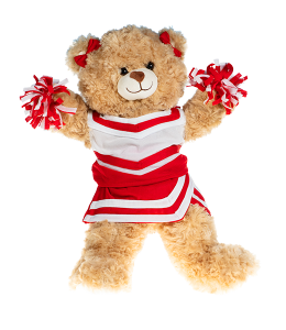 Light cream colored bear in a red and white cheerleading uniform with poms in paws and bowties on the ears