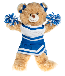 Small light cream colored bear in a royal blue and white cheerleading uniform with poms in paws and bowties on the ears