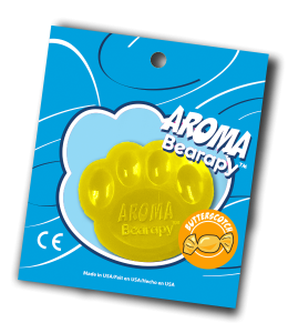 Scented aroma insert in the shape of a bear paw in yellow color in packaging