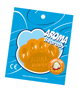 Scented aroma insert in the shape of a bear paw in orange color in packaging