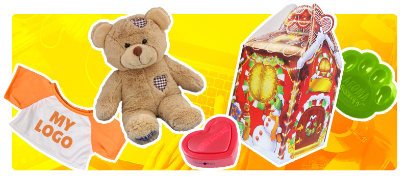 Plush teddy bear, T-shirt, insert heart module, scent chip and a carry home box on orange background