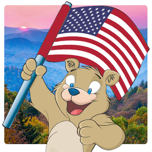 Ted mascot holding a USA flag over Smokey Mountain background
