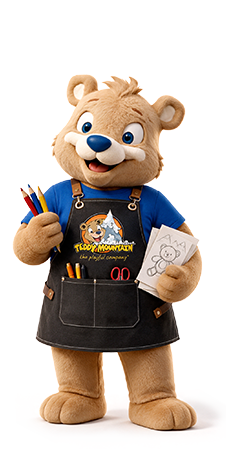 Ted Head holding custom design sketches and pencils